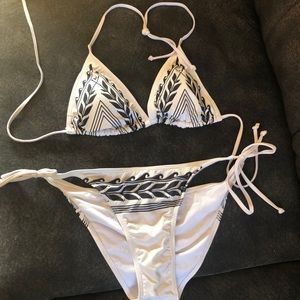 White with black bikini.